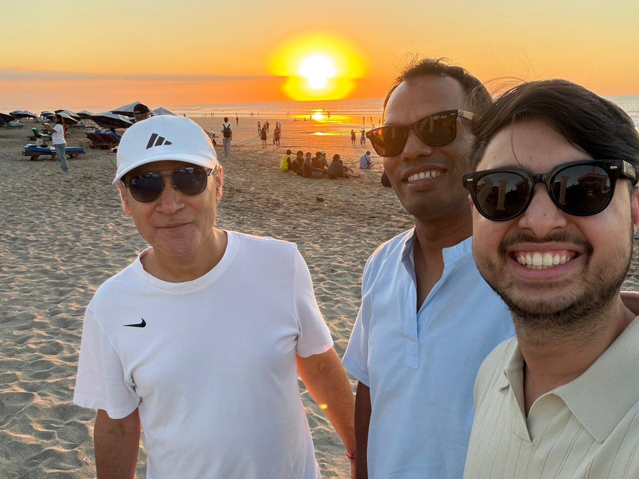 Prof. Khanal and colleagues at sunset on a beach in Bali